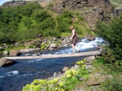 Crossing the stream on the way back from Glymur.